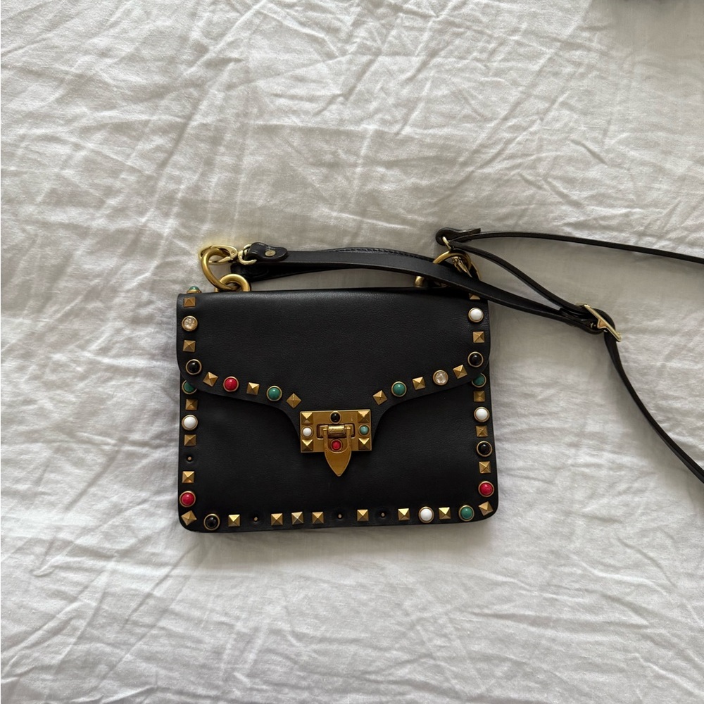 Authentic Valentino bag
Some beads missing as shown in pics